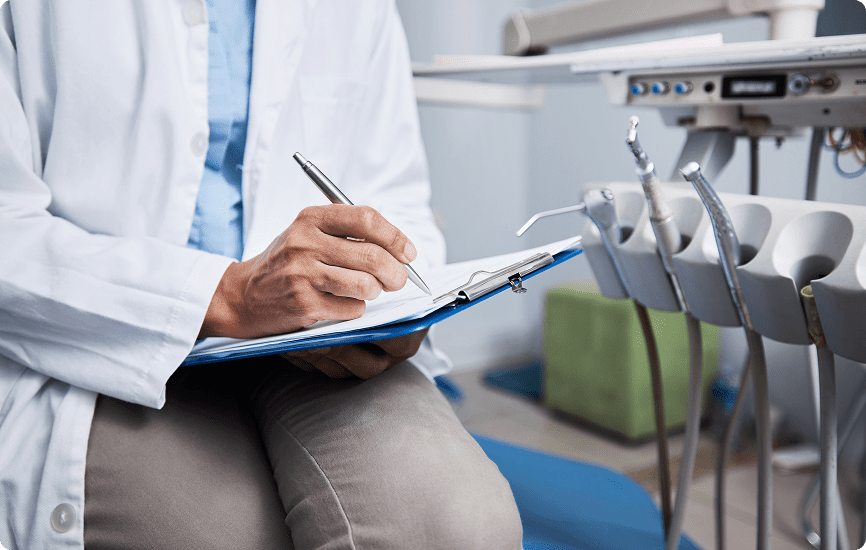 Clinic staff documenting in dental office